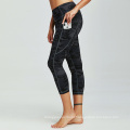 Leggings Capri por atacado Esportes de calças de ioga apertadas com bolsos calças sem costura Mulheres Capri Cropped calças